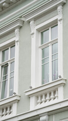 Obraz premium details of a building. facade. Windows. photo during the day.