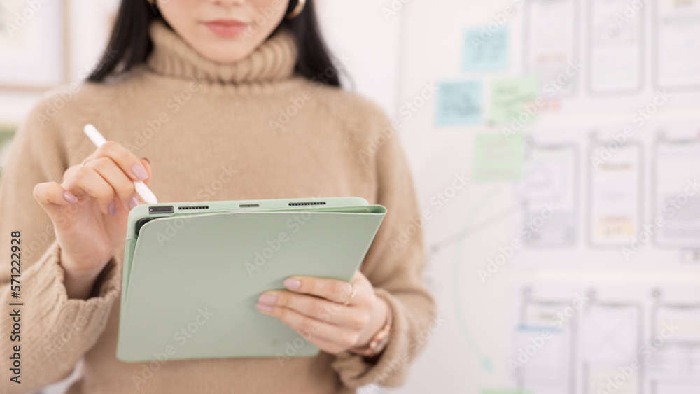 Aufkleber Woman, tablet and ui ux design with the developer being creative for mobile app project with a pen in office. Female planning, web design and development of wireframe on storyboard for website idea