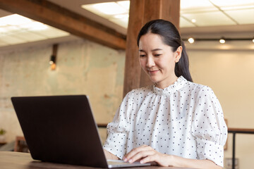 woman work using computer hand typing laptop keyboard contact us.student study learning education online.adult professional people chatting search at office.concept for technology device business