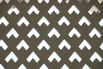 Air ventilation roster pattern on the walls of the mosque. wall ornaments made of concrete. construction ornaments material. 