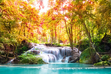 Waterfalls in the emerald blue water in Erawan National Park. Erawan Waterfall is a beautiful natural rock waterfall in Kanchanaburi, Thailand.Onsen atmosphere.