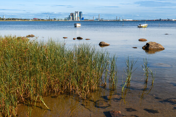 Halmstad coastline of Kattegat sea with industrial port in background.