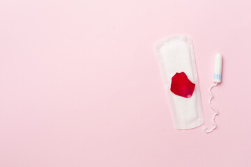 Menstruation hygiene products on color background, top view