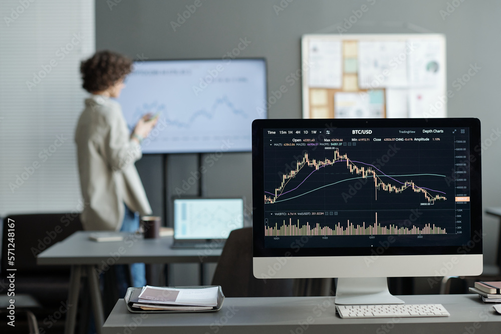 Poster Computer screen with financial statistics illustrated by graph and chart and young female economist making presentation on background
