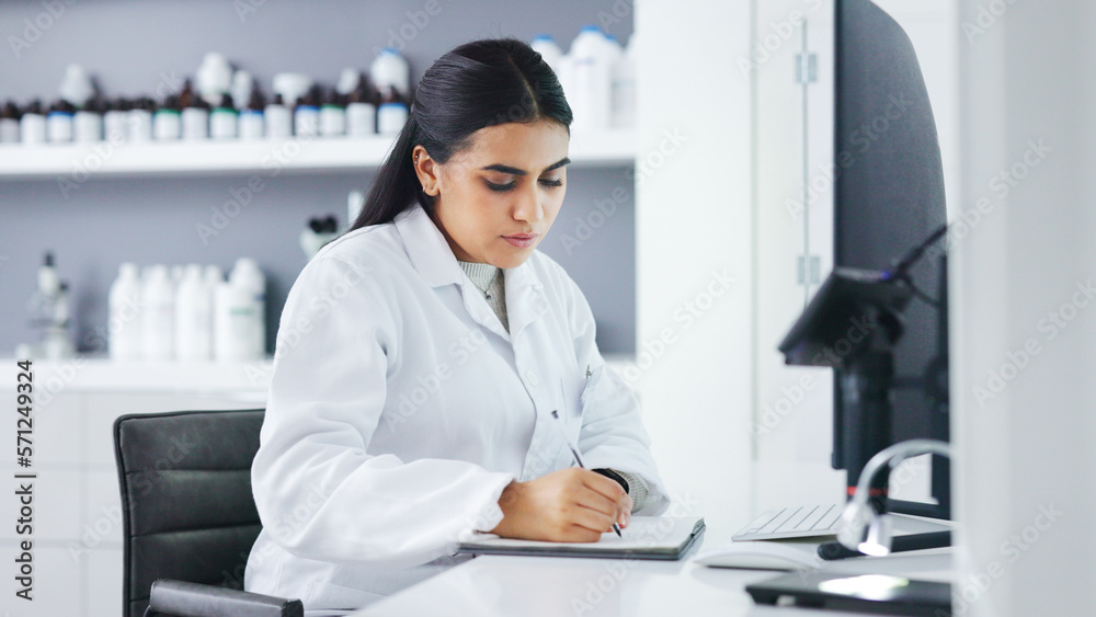 Poster Young scientist using a computer and microscope in a lab. Female pathologist analyzing medical samples while doing experiments to develop a cure. Microbiologist conducting forensic research