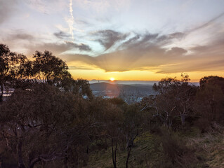 A sunset view from Mt. Ainslie over the suburbs of Canberra, Act, Australia,  towards Black Mountain.