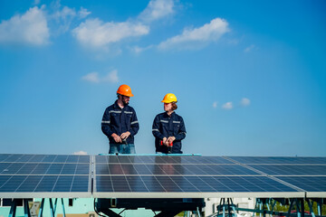 Technology solar cell, Engineer service check installation solar cell on the roof of factory. technician checks the maintenance of the solar panels