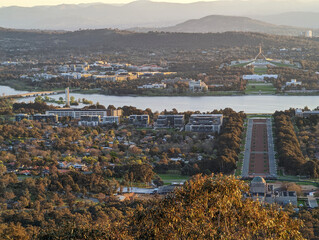 A view of Anzac Parade towards the centre of Canberra, ACT, Australia, and beyond to  Parliament House.