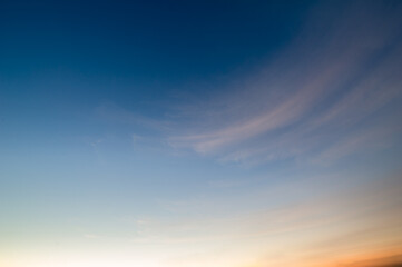 Fototapeta premium dusk sky and fluffy soft white cloud background and texture, concept for freedom and bright ozone air, design for backdrop and nature wallpaper 