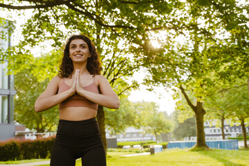 Young middle eastern woman doing exercise during yoga practice