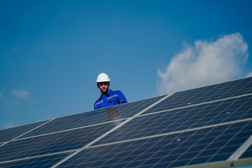Technology solar cell, Engineer service check installation solar cell on the roof of factory. technician checks the maintenance of the solar panels
