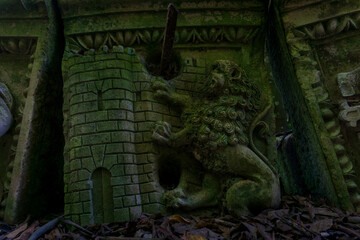 Ancient stone reliefs covered with moss