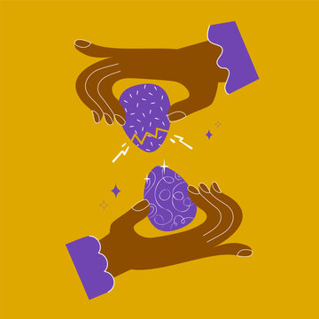 Two hands holding decorated easter eggs and playing easter egg shell crack game . Concept for challenge cracking eater eggs on easter dinner with family and friends.