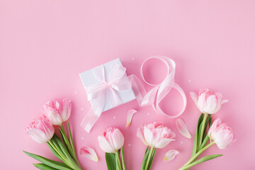 Spring tulip flowers, gift or present box and number 8 for Happy Women Day. Greeting card in pink colors.