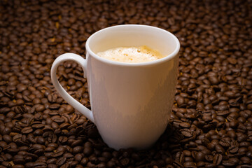 Different types of coffee: drinkable coffee, coffee beans and ground coffee
