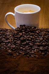 Different types of coffee: drinkable coffee, coffee beans and ground coffee