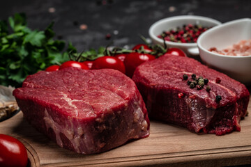 Beef Tenderloin fillet with rosemary and spices. Preparing fresh beef steak ready to cook, Long banner format. Restaurant menu, dieting, cookbook recipe. place for text. top view