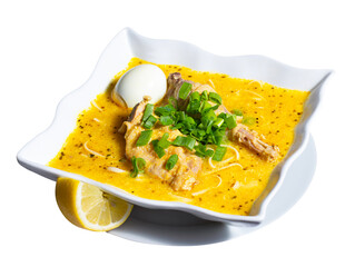 Chicken soup isolated on white, Peruvian traditional food
