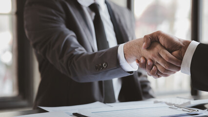 Business investor group holding hands, Two businessmen are agreeing on business together and...