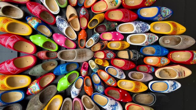 Klompen traditional wooden shoes in the Netherlands. Zaanse Schans, North Holland, Netherlands. May 15, 2022 Vertical video. High quality 4k footage