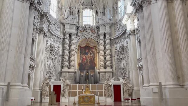 Altar of Theatine Church in Munich city. Catholic religion landmark interior, baroque architecture details concepts