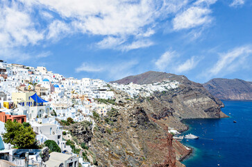 Spectacular views from the sea of Oia, above the cliffs, Santorini, Greece