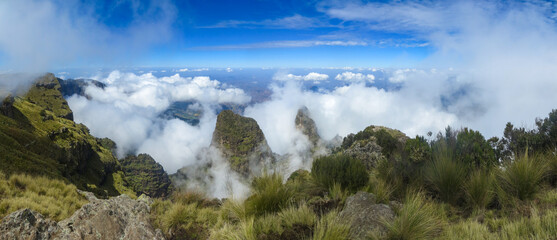 Panoramic view of valley and mountain landscape with clouds in the Simien Mountains Ethiopia, Africa
