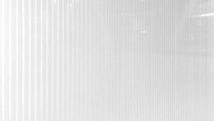 white polycarbonate in perspective view use as background, banner or wallpaper. polycarbonate plastic texture. transparent material corrugated plastic surface use for partition wall or roofing.