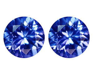 Natural gemstone blue sapphire on gray background