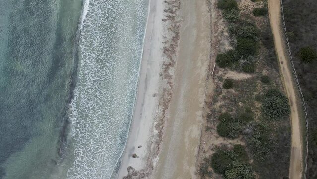 Aerial view of the shoreline at Vendicari Natural Reserve waterfront, Noto, Syracuse, Sicily, Italy.