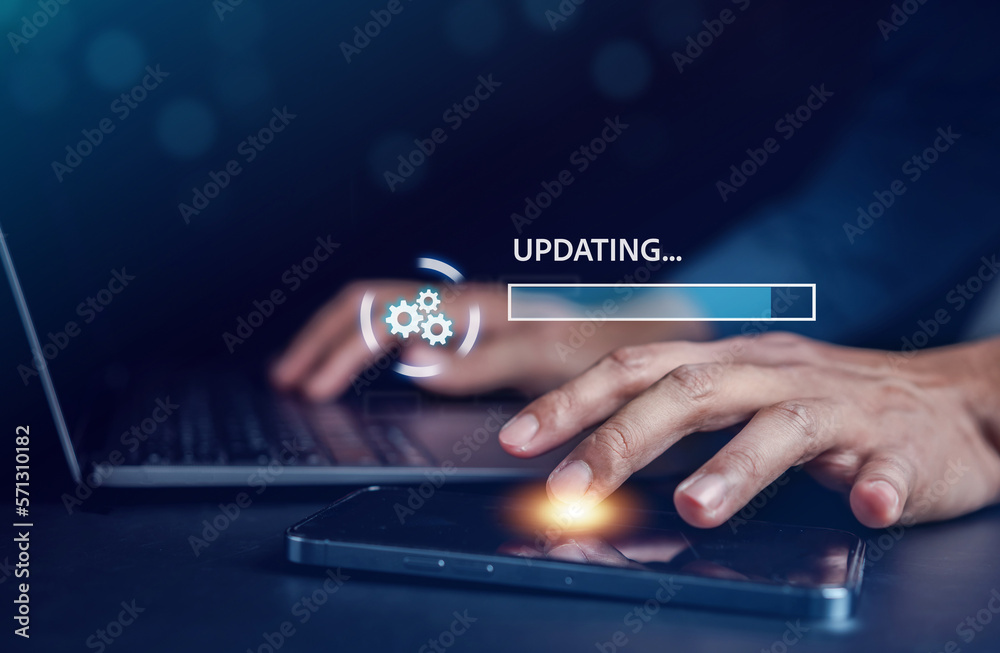 Aufkleber Update software system in computer. Man using smartphone upgrade program, Business technology internet loading virtual bar with installing the update for the quality better...
