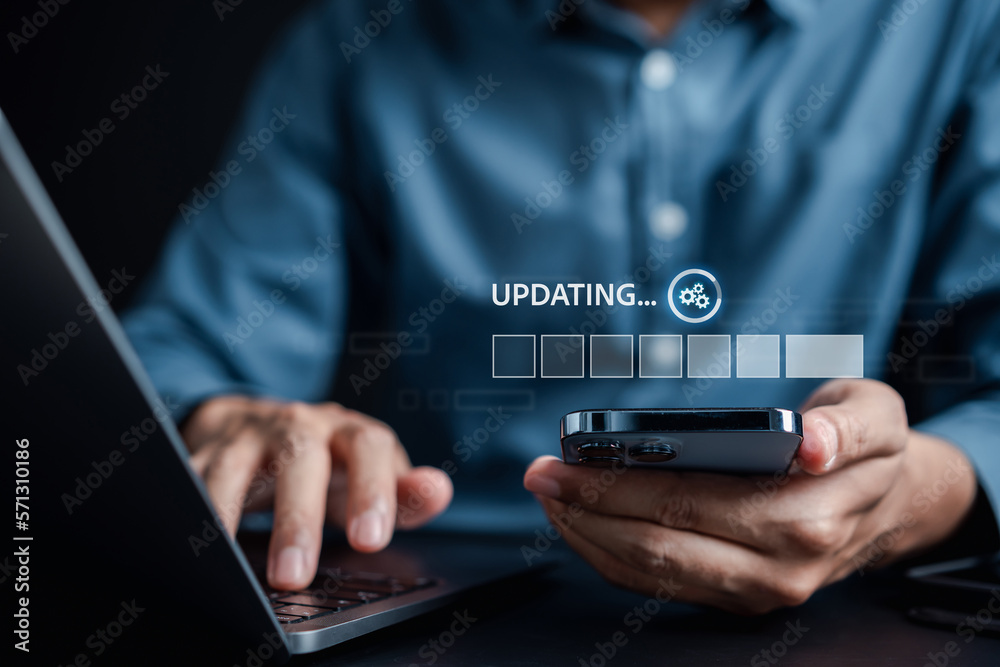 Aufkleber Update software system in computer. Man using smartphone upgrade program, Business technology internet loading virtual bar with installing the update for the quality better...