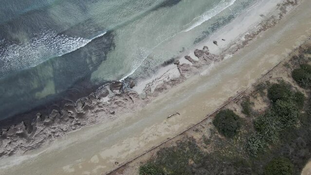 Aerial view of the shoreline at Vendicari Natural Reserve waterfront, Noto, Syracuse, Sicily, Italy.