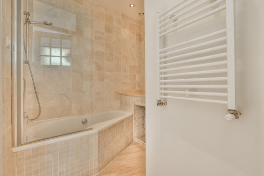 Bathroom interior with heated towel rail