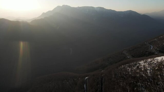 Aerial view of Mount Terminio peak with snow in wintertime, Serino, Avellino, Irpinia, Campania, Italy.