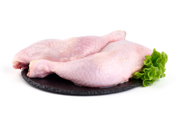 Raw chicken leg quarters, isolated on white background. High resolution image.