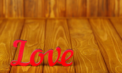 wooden inscription I love you on a wooden background