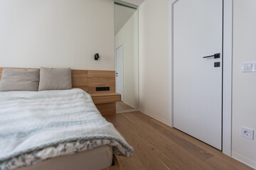Interior of comfortable modern bedroom