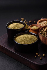 Spice dried dill or basil in the form of green powder