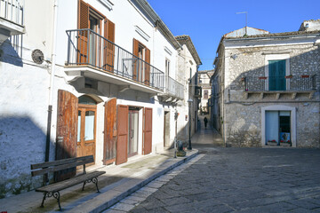 A narrow street between the old houses of Bovino, an ancient town in Puglia, Italy.