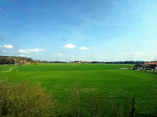 Obraz premium Europe landscape from road trip to the green field and blue clear sky 