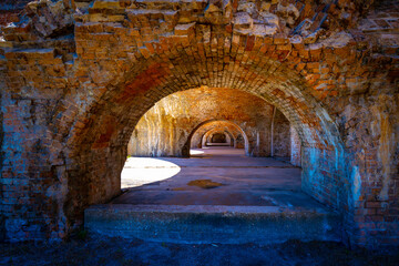 Fort Pickens Historic Arches, landmark ruins of red brick structures for sightseeing and tourist destination in Pensacola, Florida, USA