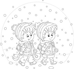 Happy little schoolboy and schoolgirl with their backpacks cheerfully chatting and going to school through snowfall on a cold winter morning, black and white outline vector cartoon illustration
