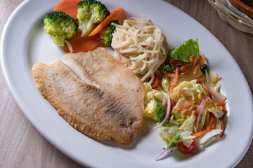 Healthy fish fillet with rice