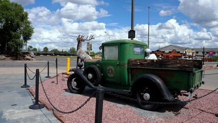 Street scene with classic cars in front of souvenir shops in Williams, one of the cities on the famous route 66 Old historic city of Williams in Arizona.