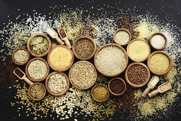 Colorful mix of grain varieties: oat and wheat, rice and millet, buckwheat and barley, quinoa and...