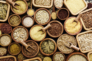 Colorful mix of grain varieties: oat and wheat, rice and millet, buckwheat and barley, quinoa and...
