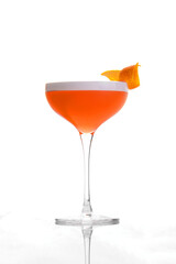 orange alcoholic drink in a cocktail glass