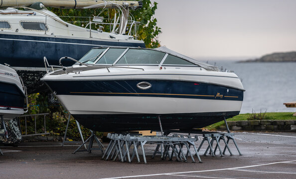 Kungsbacka, Sweden - October 23 2022: Yamarin boat laid up for the winter on a parking lot.