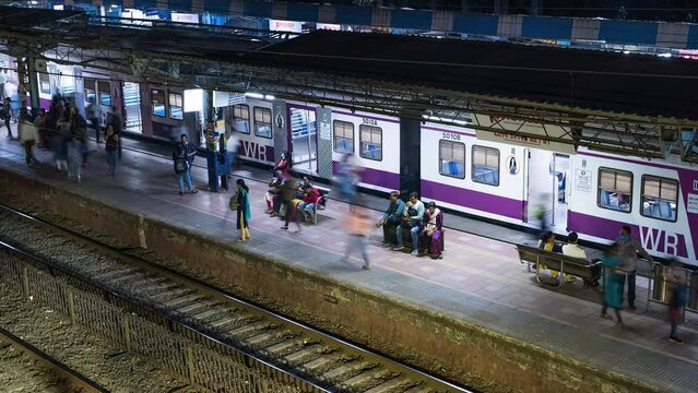 India train station night Mumbai timelapse hyper lapse 4k panoramic, Maharashtra